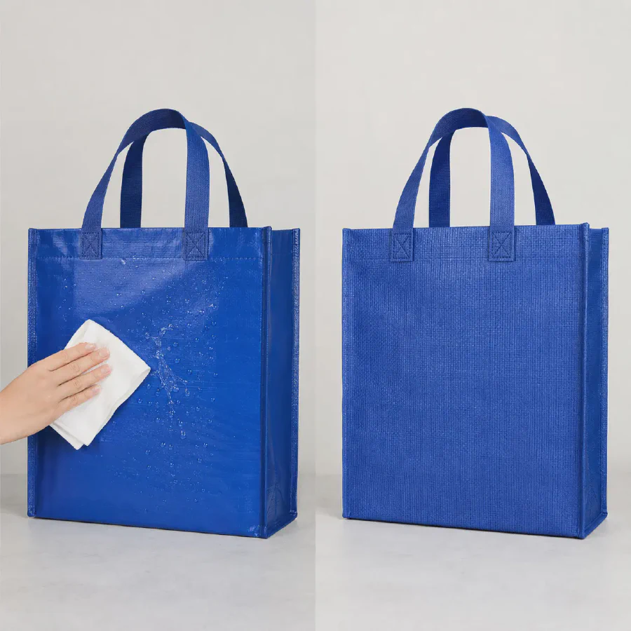 A laminated blue PP woven bag being wiped clean beside an unlaminated woven bag