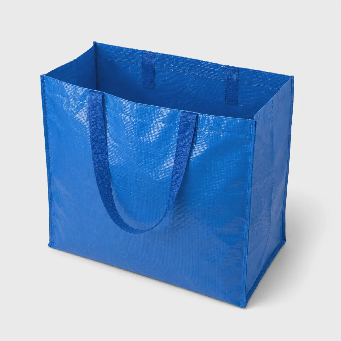Blue laminated woven shopping bag showing the open top and side gusset